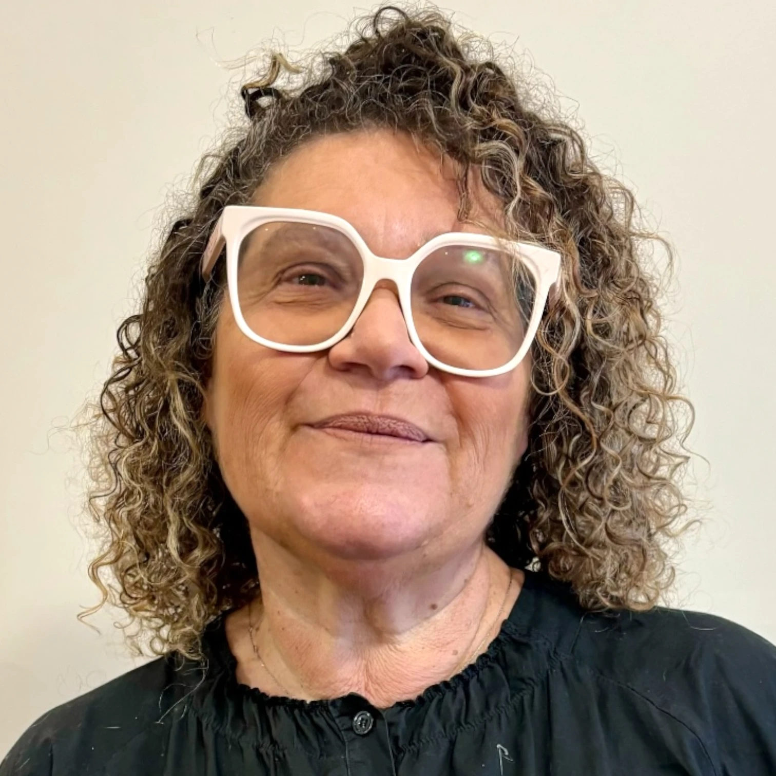 Corinne L.